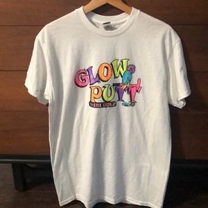 Show up styling in neon vibes with this unique Glow Putt t-shirt. Size Medium